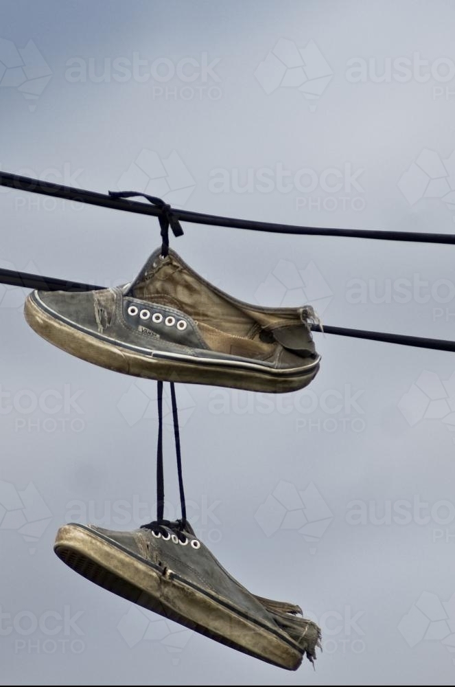 Old shoes on wire - Australian Stock Image