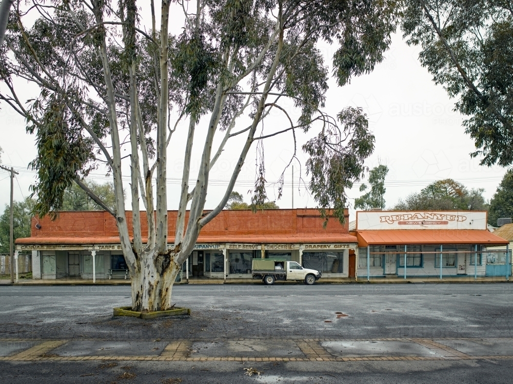 Old shops on a wide street in a country town - Australian Stock Image