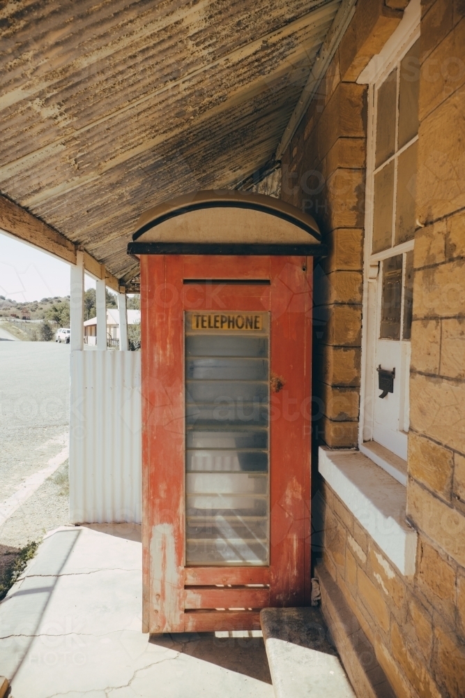 Old telephone box on the verandah of a historical building - Australian Stock Image