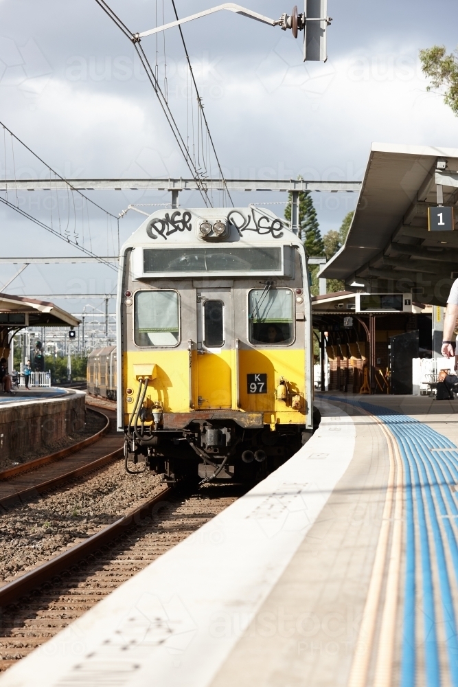 Old train arriving at the platform - Australian Stock Image