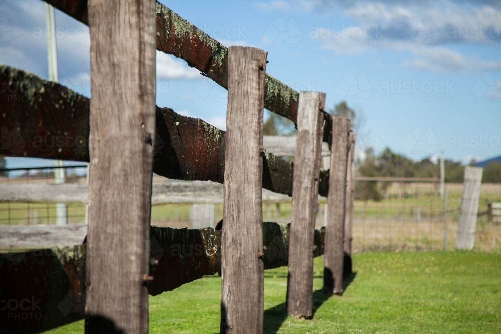 Old wooden post and rail farm fence of cattle yards - Australian Stock Image