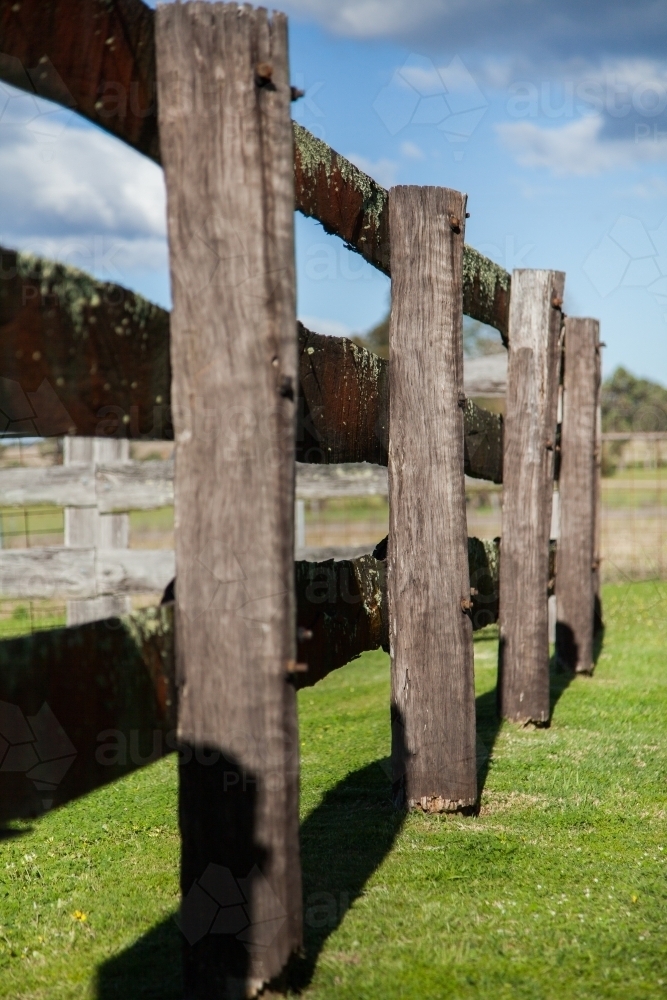 Image of Old wooden post and rail farm fence of cattle yards Austockphoto