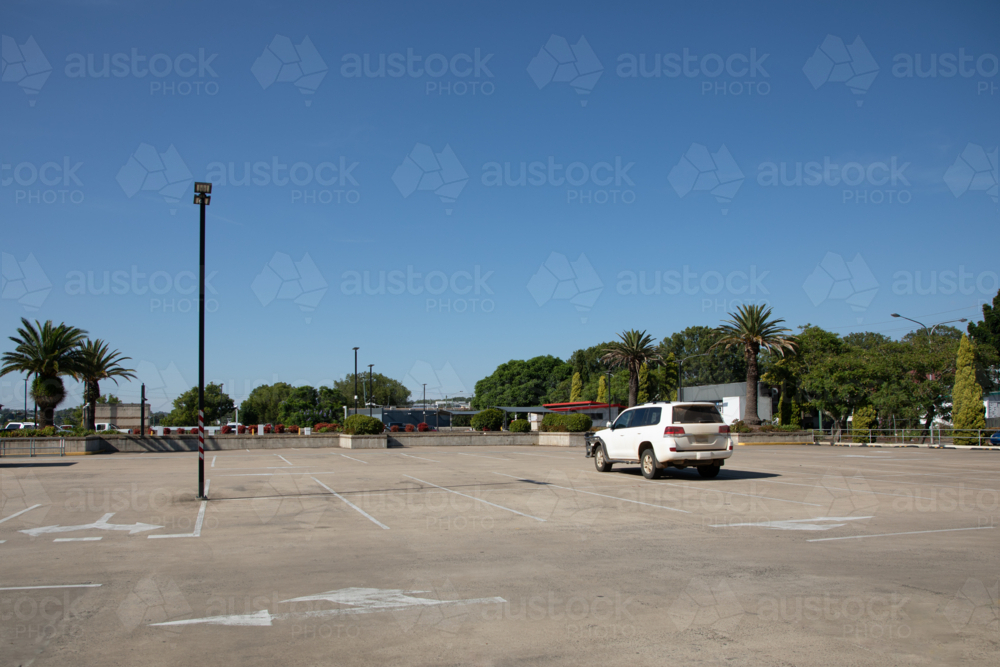 One car in a rooftop carpark - Australian Stock Image