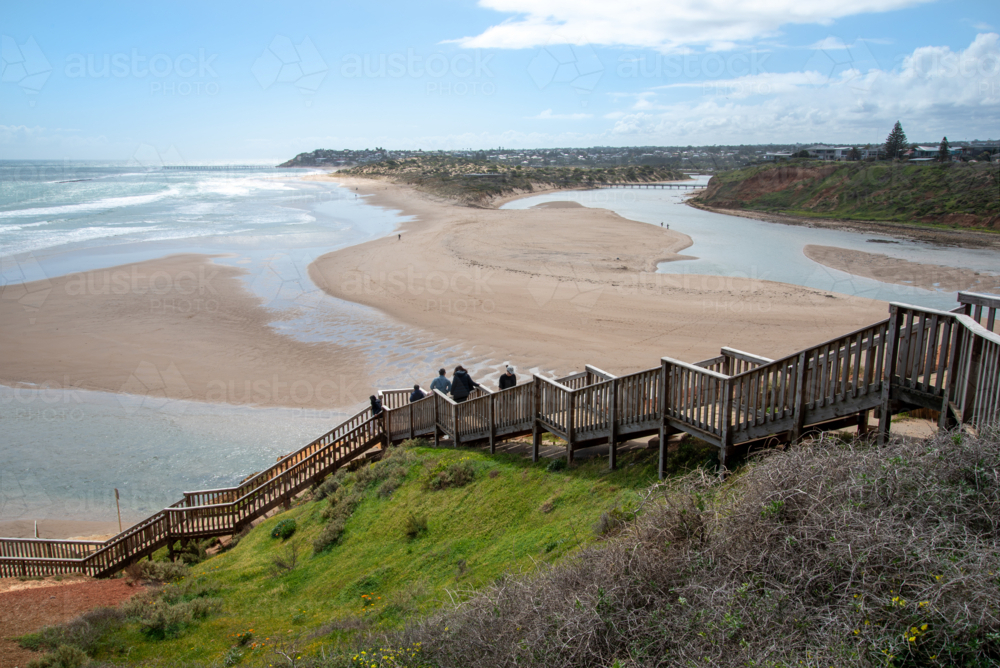 Onkaparinga River Mouth near Adelaide with a st of wooden stairs leading to the beach - Australian Stock Image