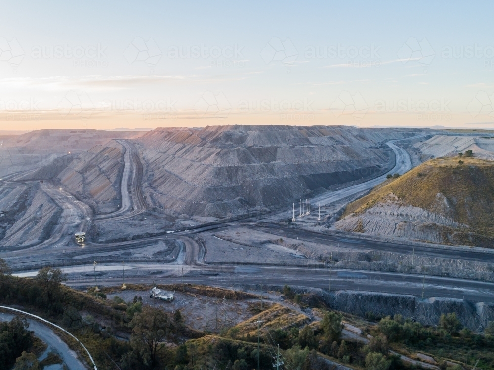 open cut coal mine in singleton area of the Hunter Valley at dusk - Australian Stock Image