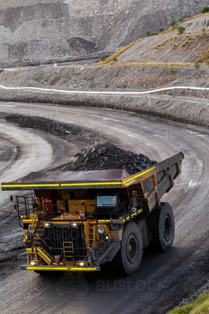 Open cut coal mine site with big machinery working - Australian Stock Image