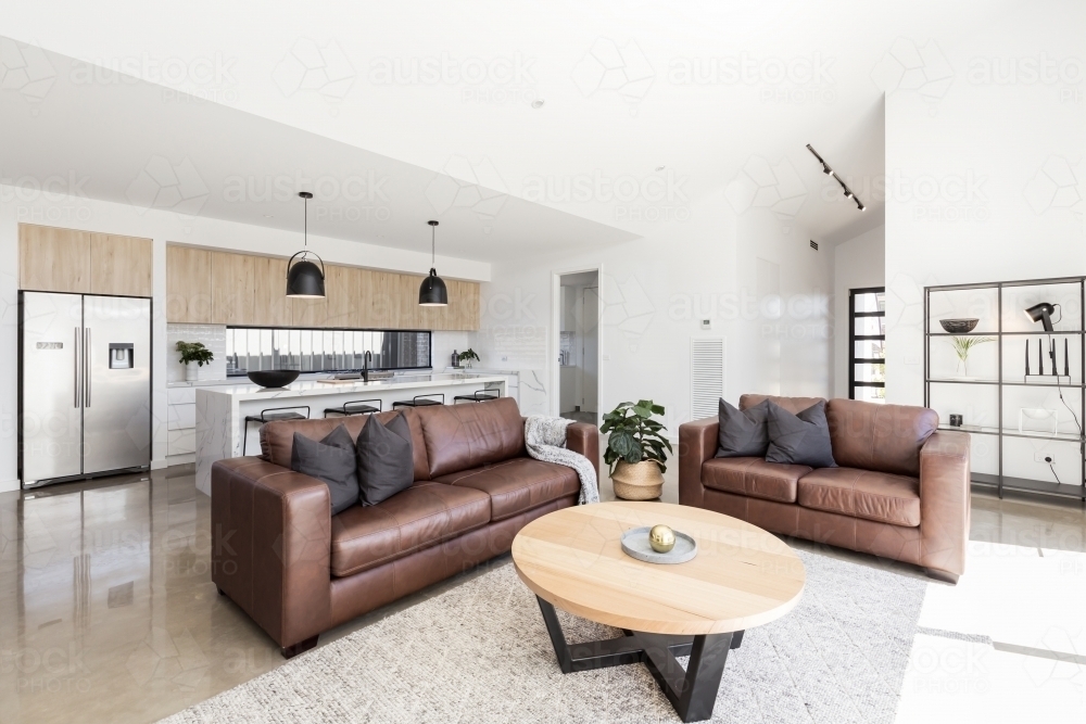 Open plan scandinavian styled family living room and kitchen - Australian Stock Image