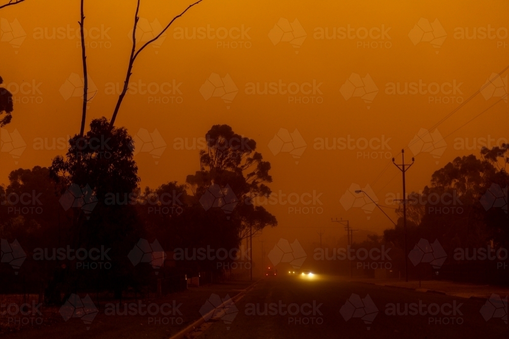 orange sky inside dust storm - Australian Stock Image