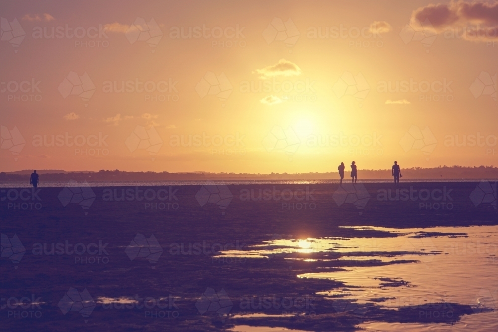 Orange sunset silhouettes - Australian Stock Image