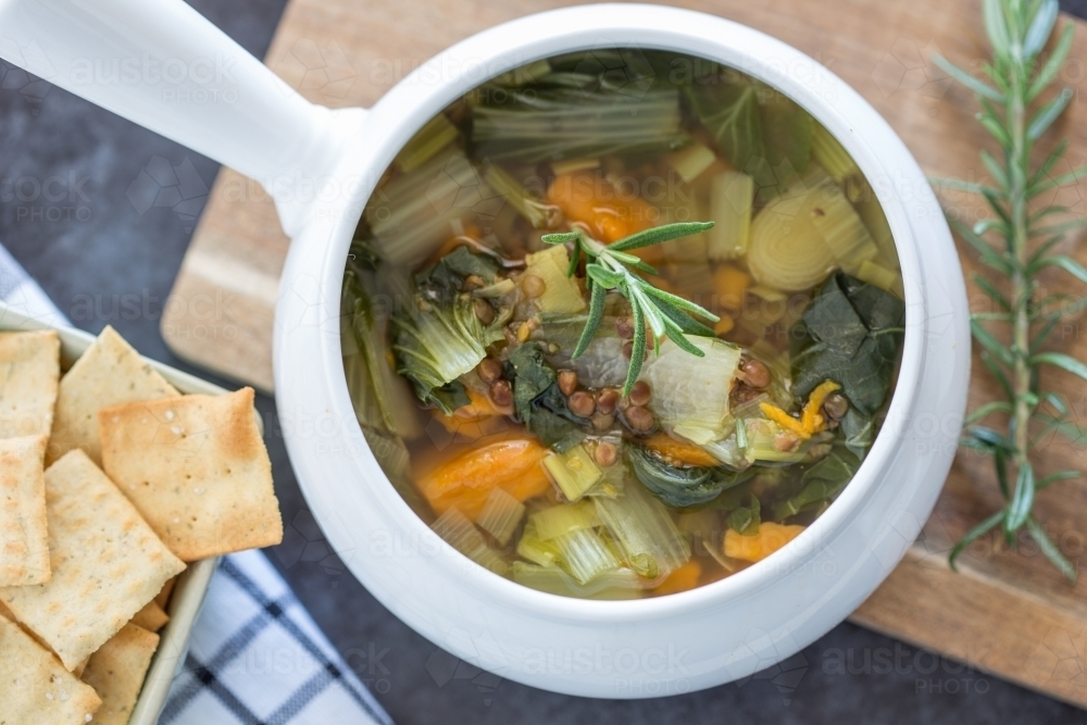 Organic Vegetable and Lentil Soup garnished with Rosemary - Australian Stock Image