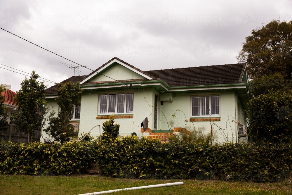 original brick and tile home in suburban brisbane - Australian Stock Image