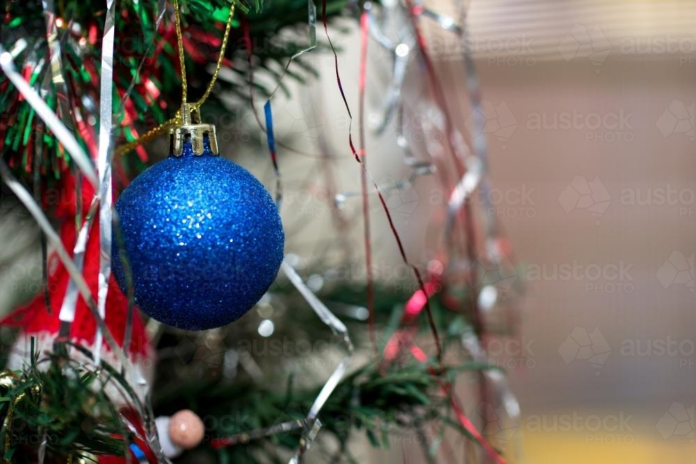 Ornaments hanging on a christmas tree - Australian Stock Image