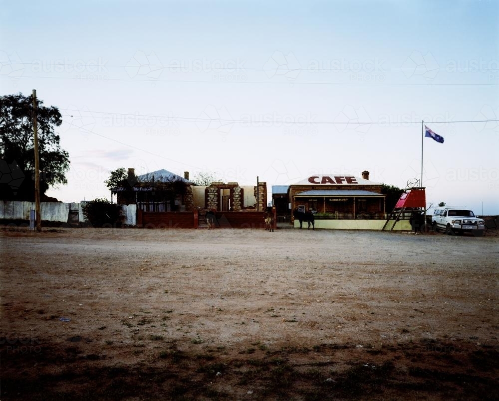 Outback Cafe viewed across a dirt road - Australian Stock Image