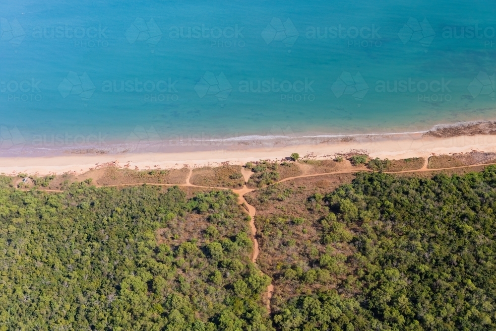 Outback dirt track leads to remote Northern Territory beach - Australian Stock Image