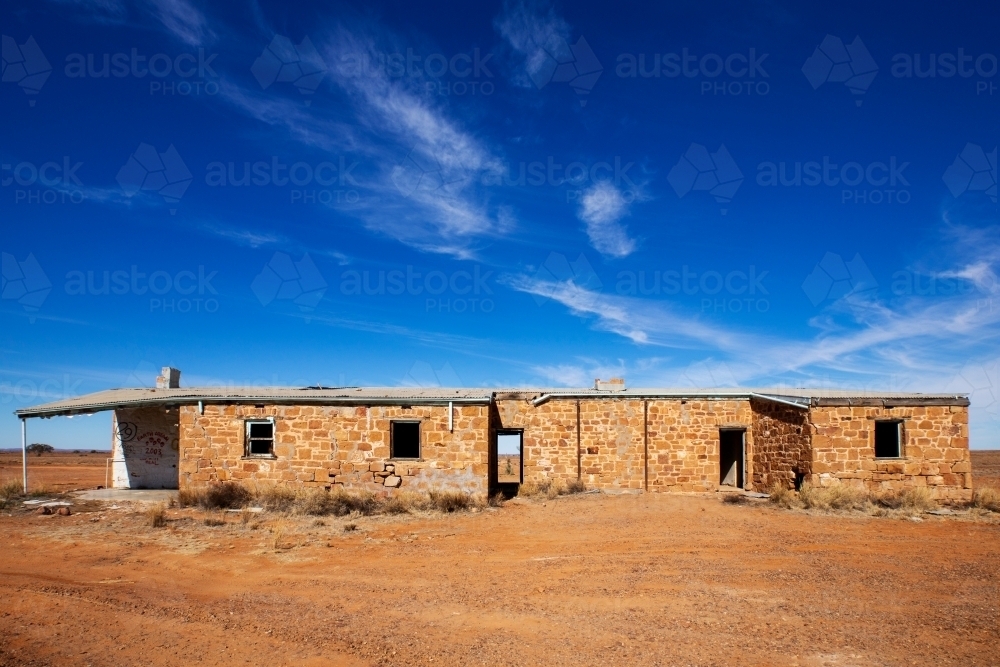 outback ruins under blue sky - Australian Stock Image