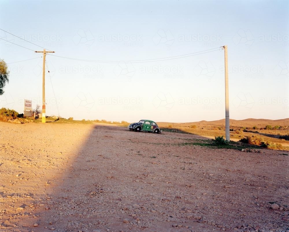 Outback scene with vintage car - Australian Stock Image