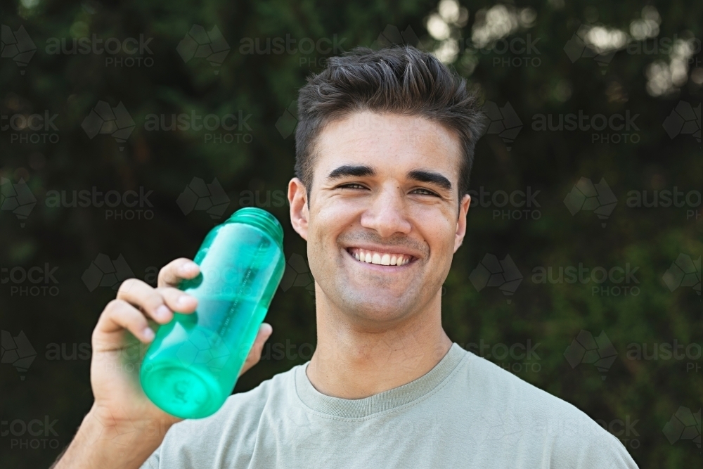 Outdoor exercise - drinking water - Australian Stock Image