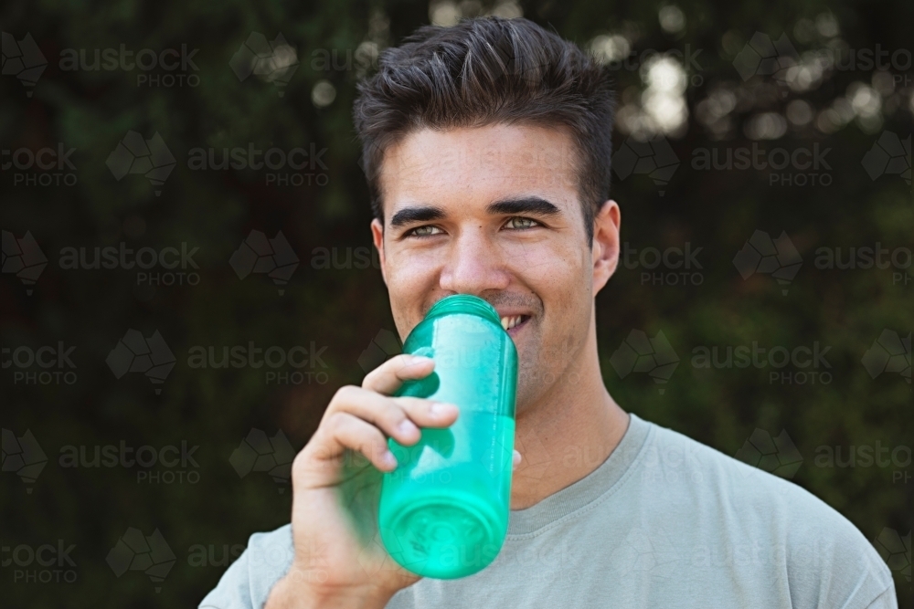 Outdoor exercise - drinking water - Australian Stock Image