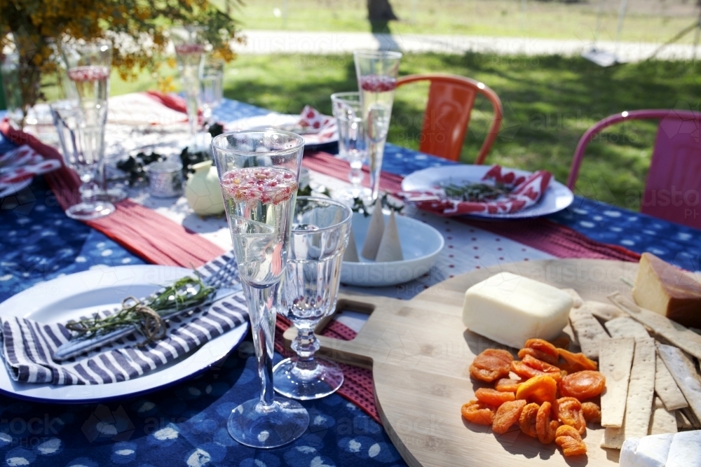 Outdoor table setting ready for Christmas celebration - Australian Stock Image