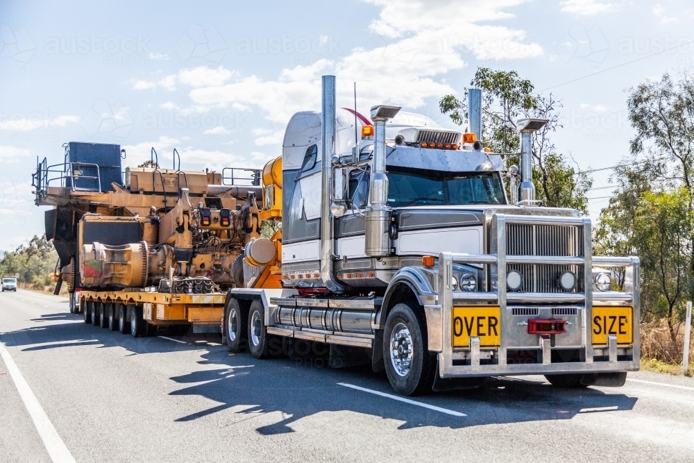 Over size load on truck transporting mining equipment - Australian Stock Image