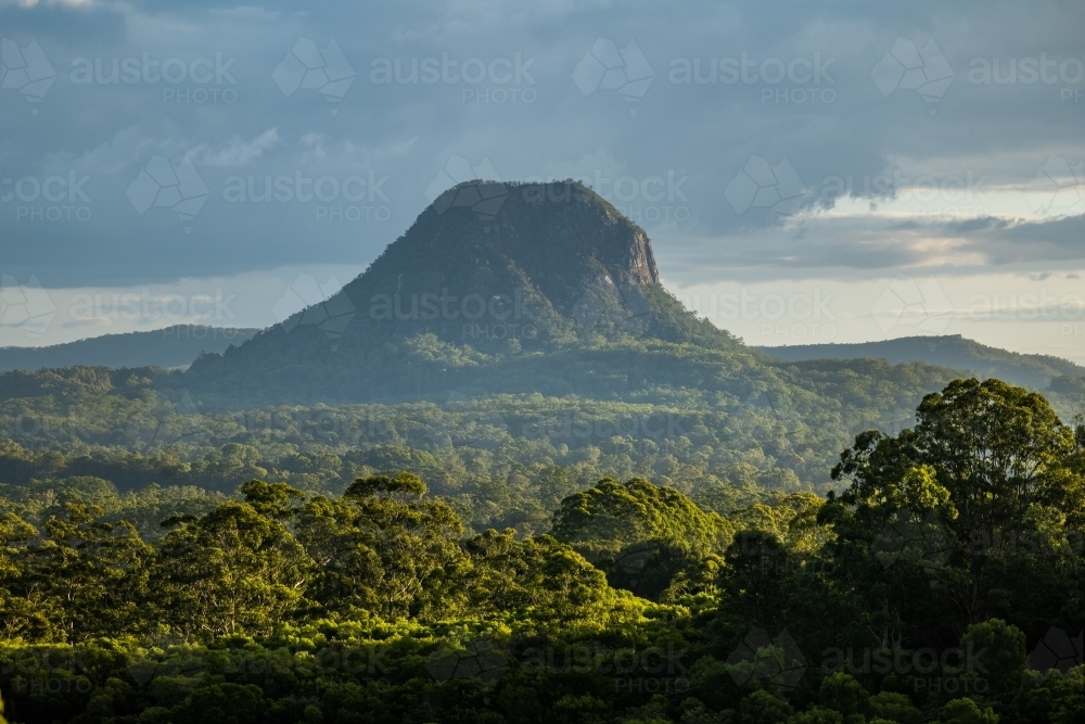 Overcast landscape with mountain in the Glass House Mountains - Australian Stock Image