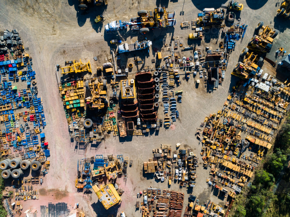 Image of Overhead aerial of industrial parts stockyard with pieces of ...