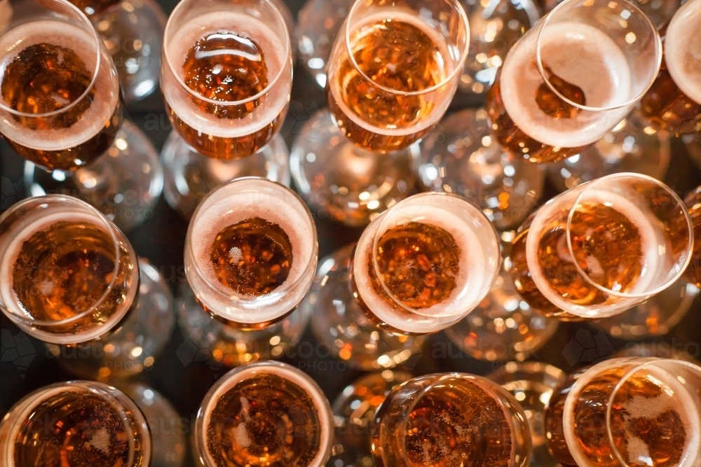 Overhead aspect of glasses with sparkling wine - Australian Stock Image