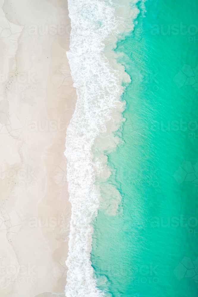 Overhead of tropical turquoise white sandy beach - Australian Stock Image