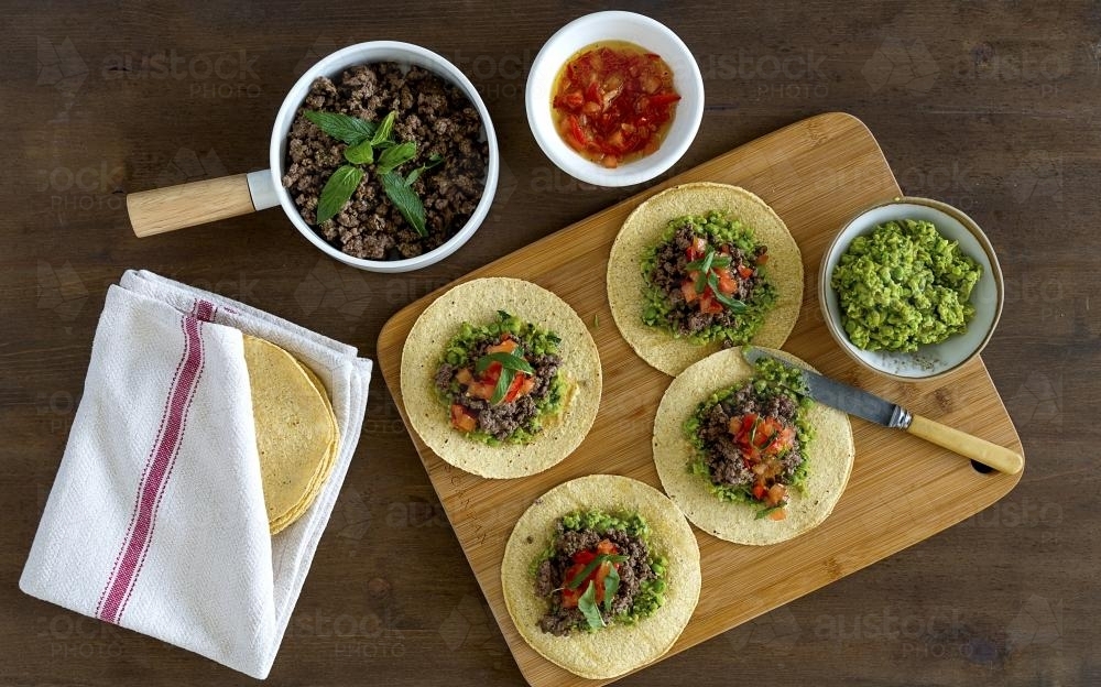 Overhead shot of Mexican style tortillas presented on table - Australian Stock Image