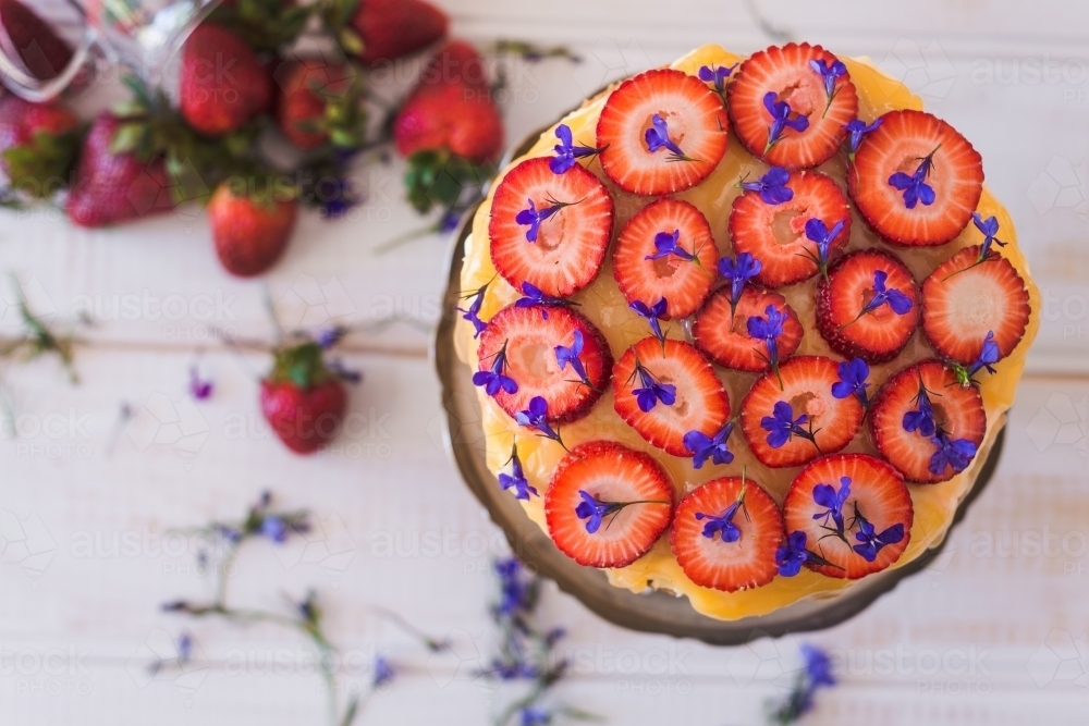 overhead strawberry detail of a lemon curd cake - Australian Stock Image