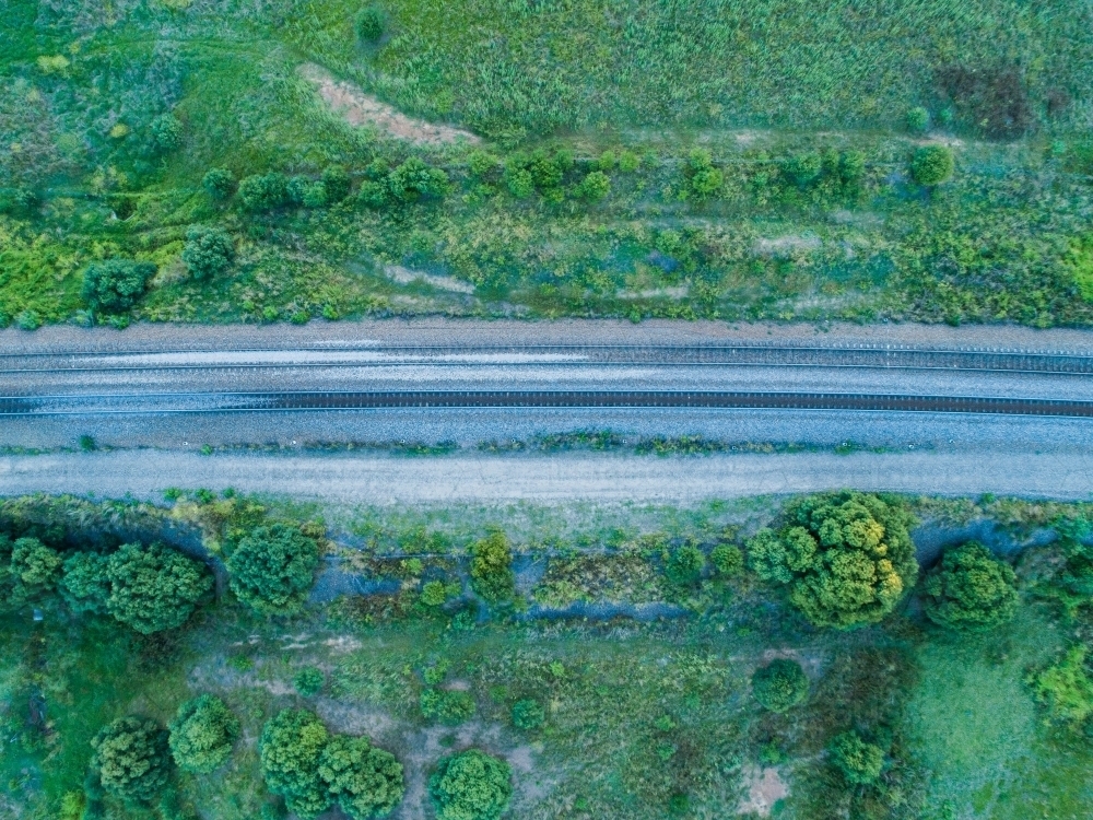 Image of Overhead top down of empty railway track in countryside ...