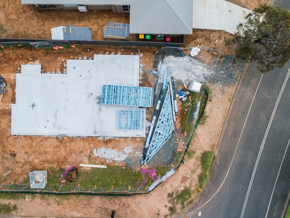 Overhead top down view of concrete slab for new house build : Austockphoto Overhead top down view of concrete slab for new house build - Australian Stock Image