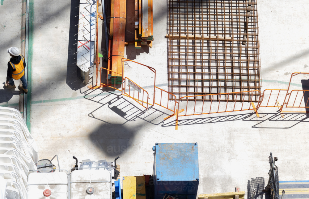 Overhead view of a construction site with construction worker - Australian Stock Image