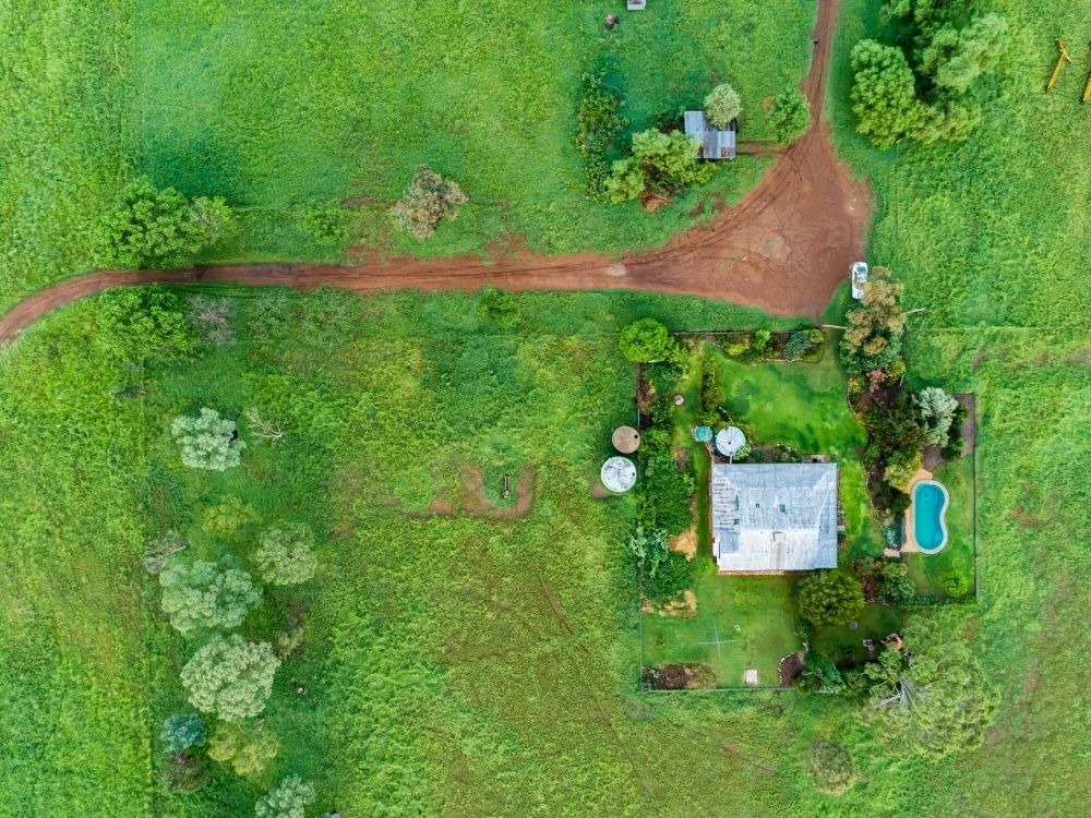 Image of Overhead view of country house on rural farm - Austockphoto
