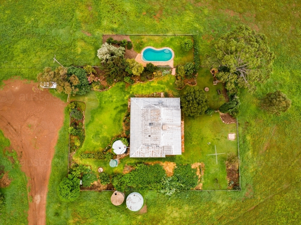Overhead view of country house on rural farm - Australian Stock Image