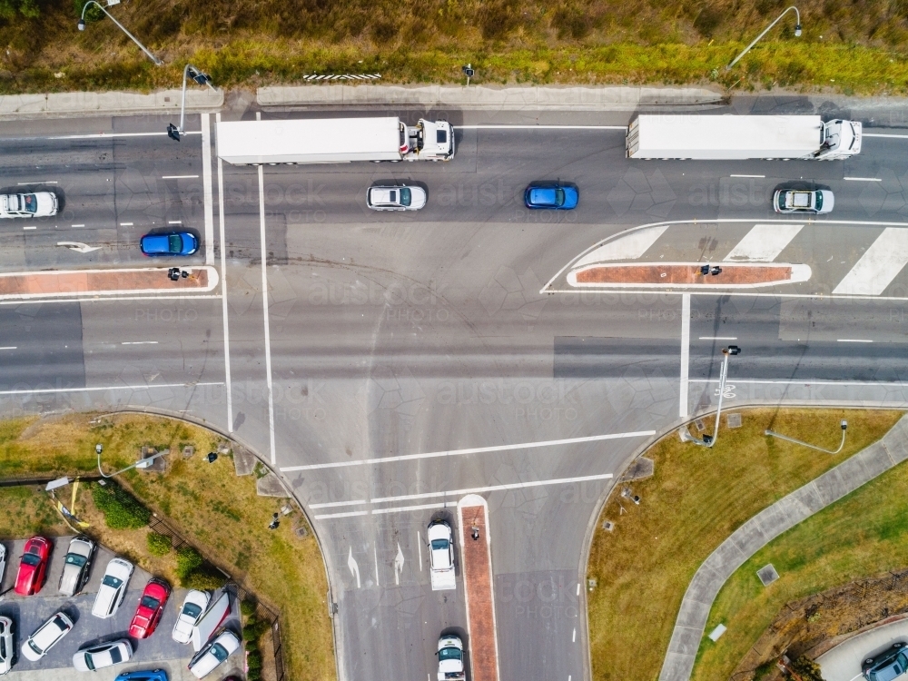 Image of Overhead view of intersection with trucks and cars on highway ...