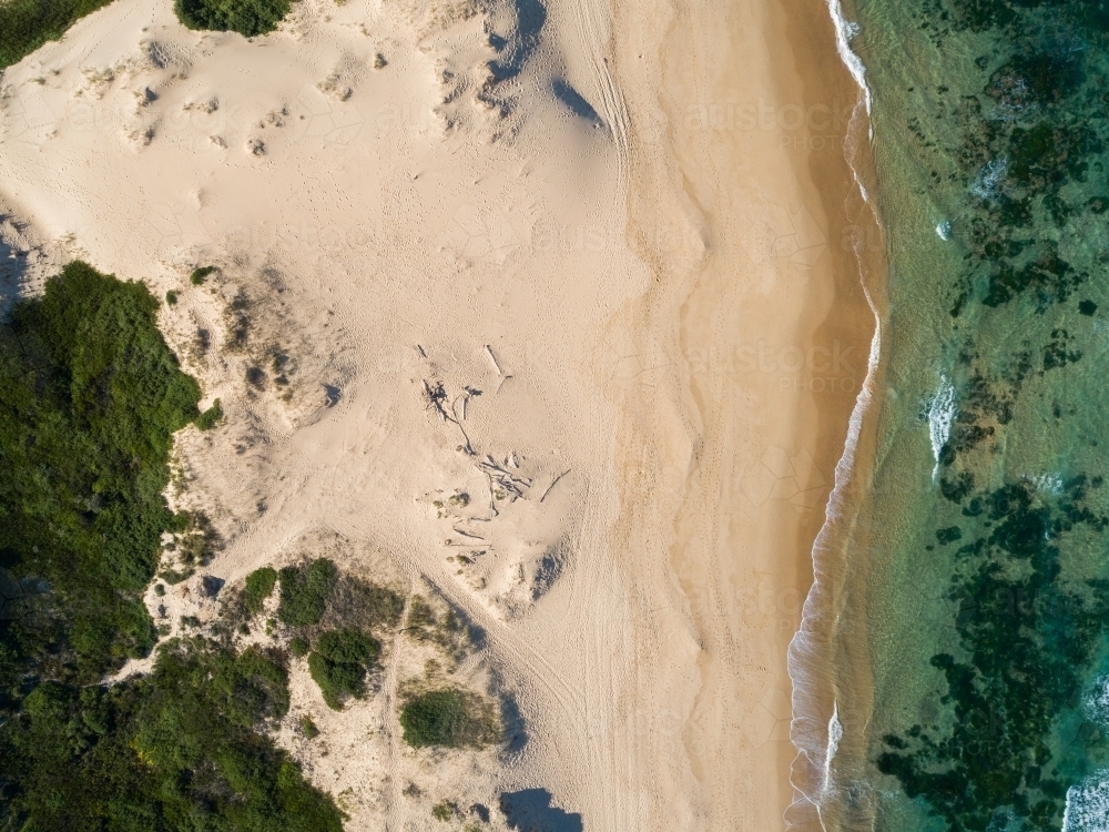 Overhead view of sand dunes to beach and ocean water - Australian Stock Image