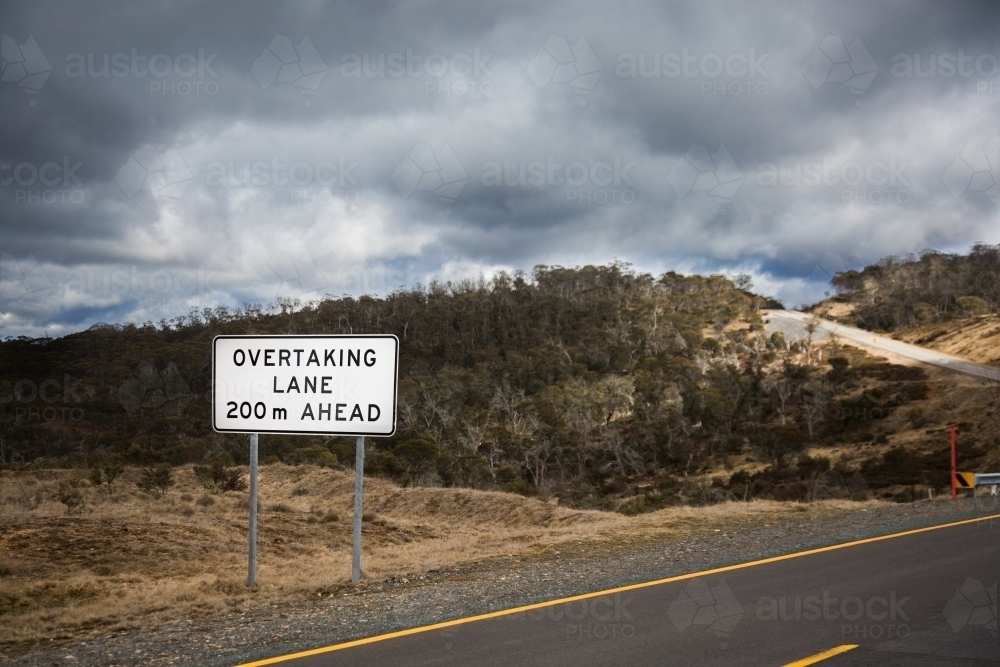 Overtaking lane sign in the snowy mountains, new south wales - Australian Stock Image