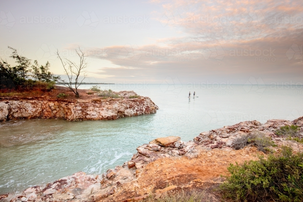 Paddle Boarders in the morning - Australian Stock Image