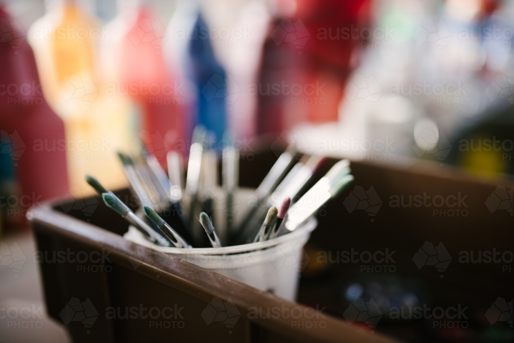 Paint brushes in a cup - Australian Stock Image