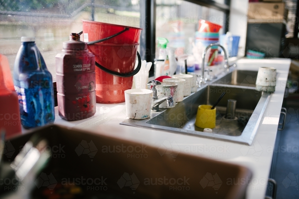 Paint Supplies in an Art class at a school - Australian Stock Image
