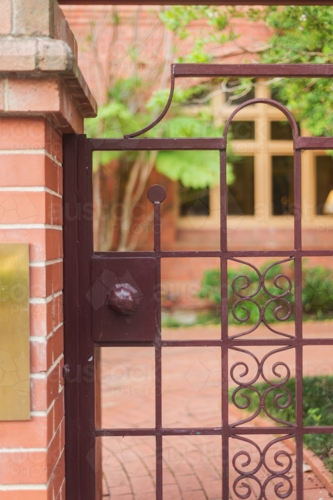painted wrought iron gate - Australian Stock Image