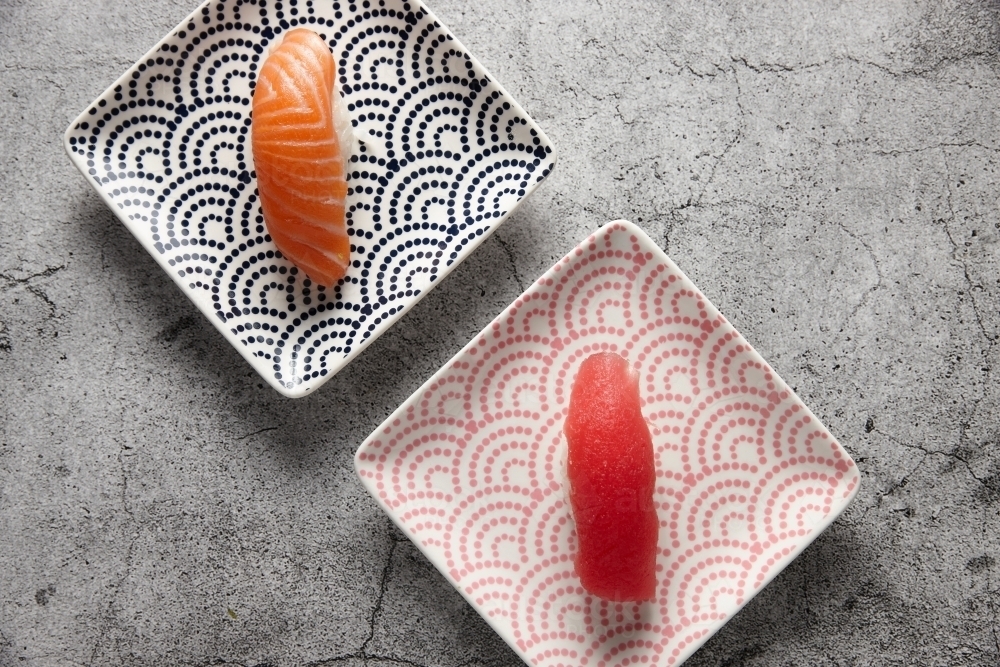 Pair of nigiri on square plates - Australian Stock Image
