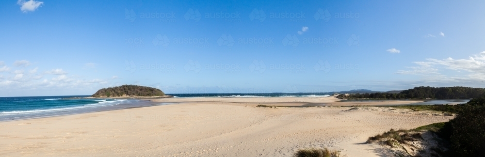 Panorama of beach and ocean with crampton island - Australian Stock Image
