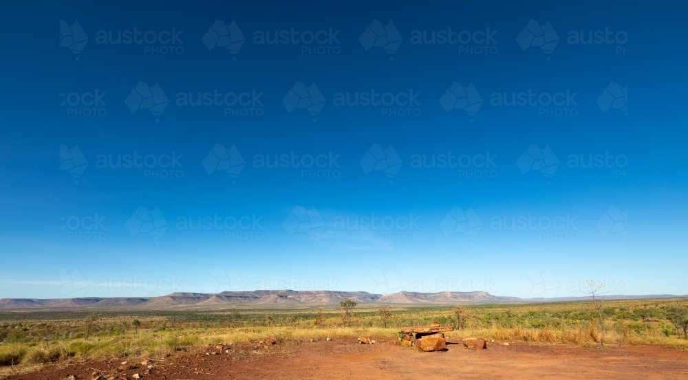panorama of the vast east Kimberley landscape with Cockburn Range and blue sky - Australian Stock Image
