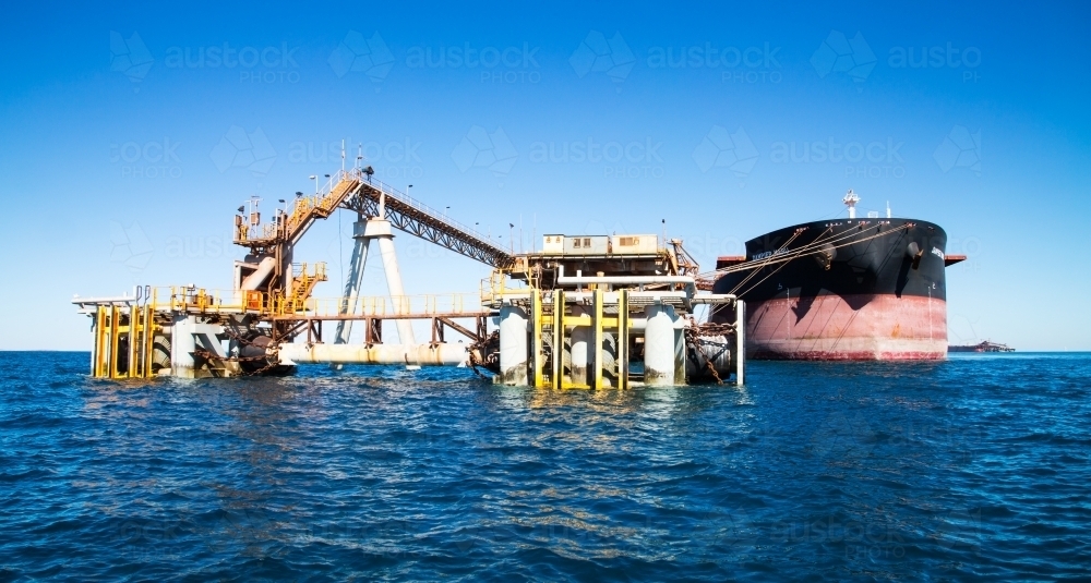 Panoramic shot of freight ship docked for loading - Australian Stock Image