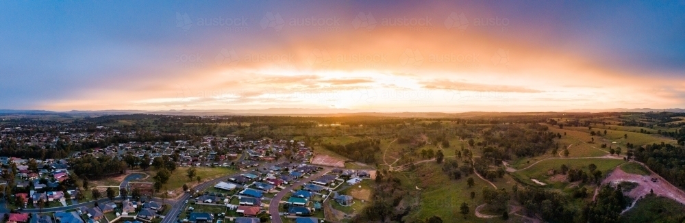 Panoramic view of clouds and light in sunset sky - Australian Stock Image