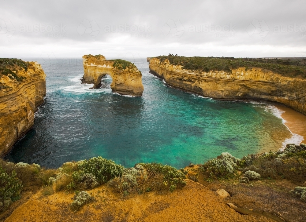 Panoramic view of limestone arch at entrance to bay - Australian Stock Image