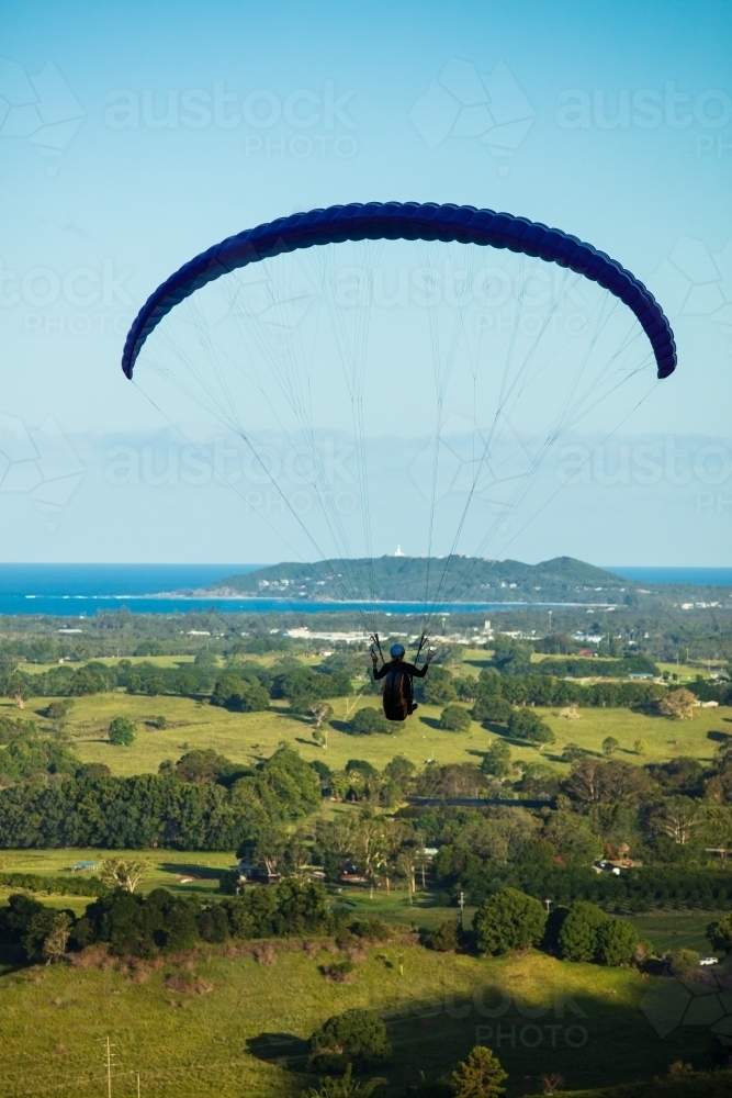 Paragliding above the hinterland near Byron Bay in the Northern Rivers. - Australian Stock Image