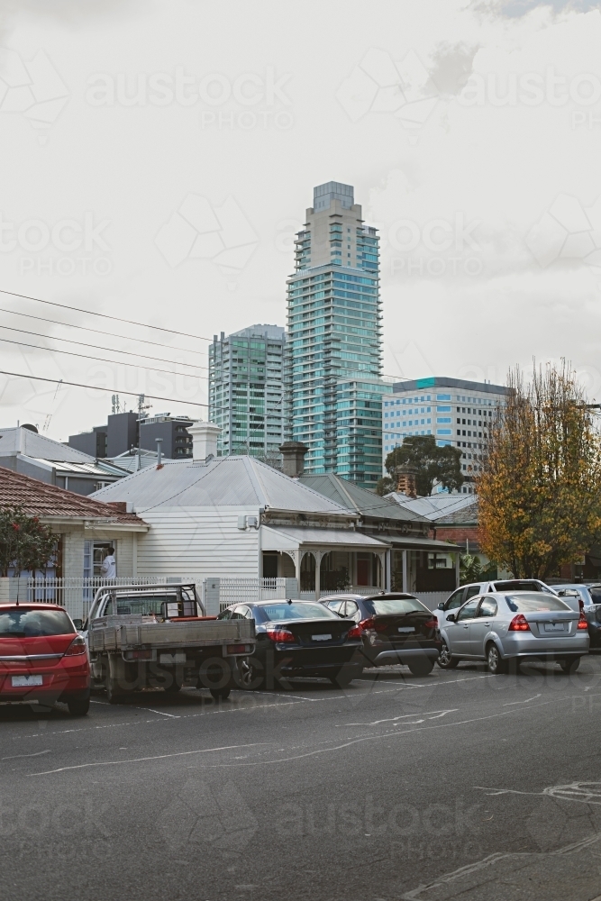 Parked cars in Albert Park with view to city buildings in Melbourne CBD - Australian Stock Image